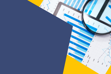 Image of data graph and magnifying glass