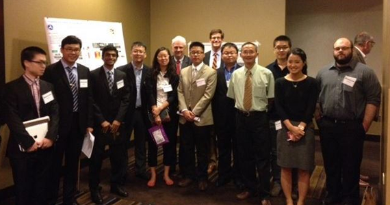 Students and Principle Investigators line up for photo after the Student Poster Paper Session at the 2014 R&D Forum
