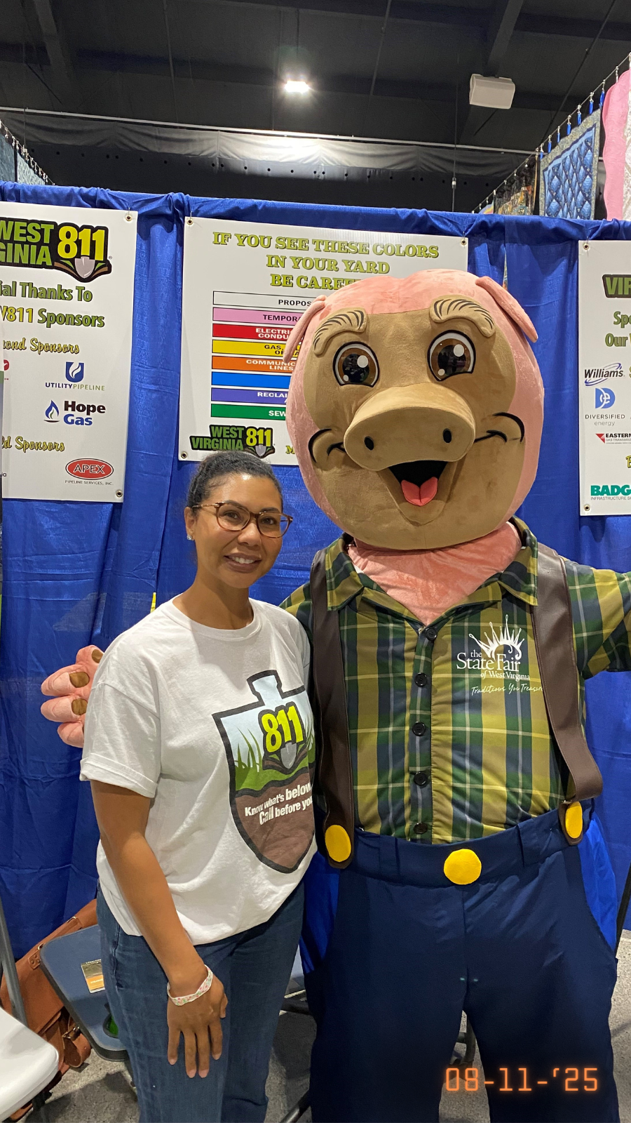 Photo of PHMSA employee with mascot